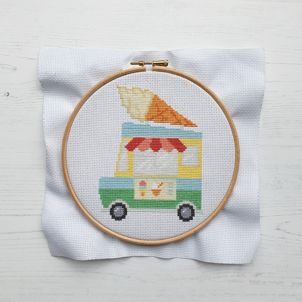 cross stitch embroidery in a hoop featuring an ice cream truck